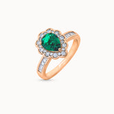 Emerald Shine 18K gold-plated ring with a bold centerpiece and delicate accents
