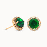 Product close up image of Elegant Emira Verde 18k gold-plated studs featuring a green stone, ideal for adding luxury to any outfit