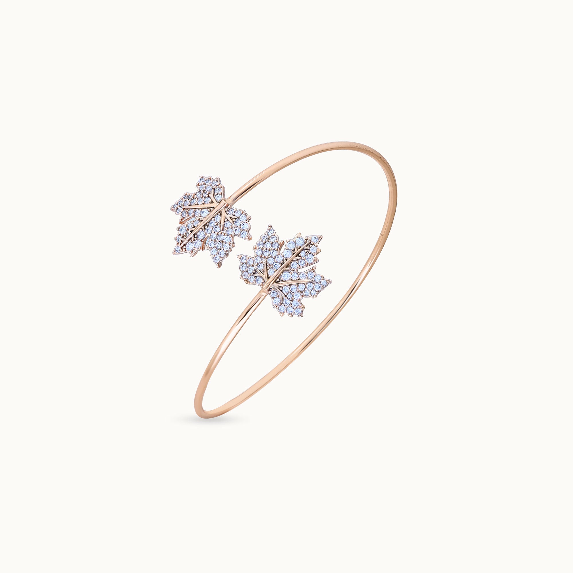 Close-up of the intricate leaf details on the gold bracelet