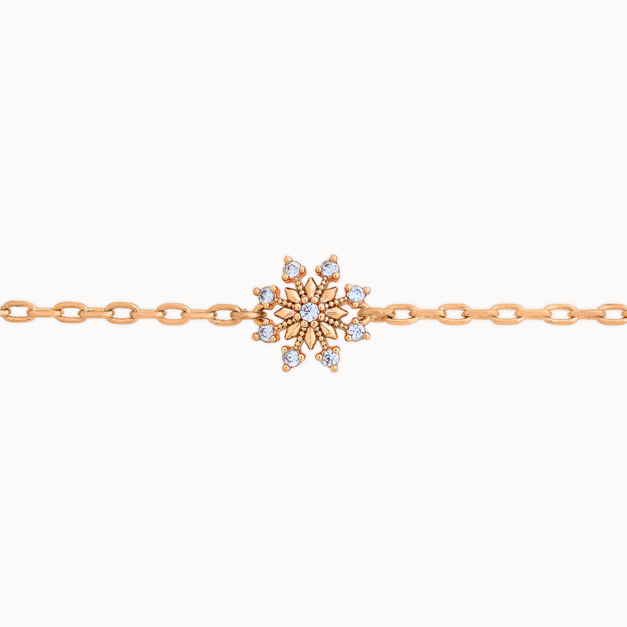 18k gold plated bracelet with snowflake radiance design close up